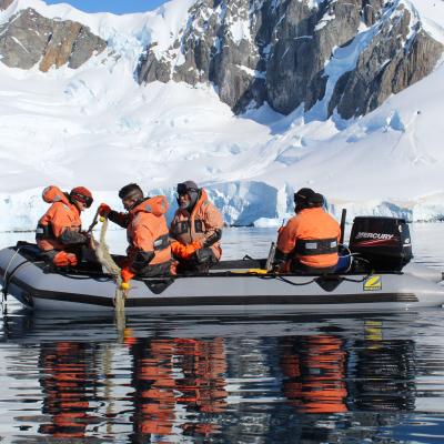Manuel Novillo with researchers on a RHIB