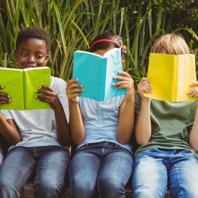 Children reading colorful books.